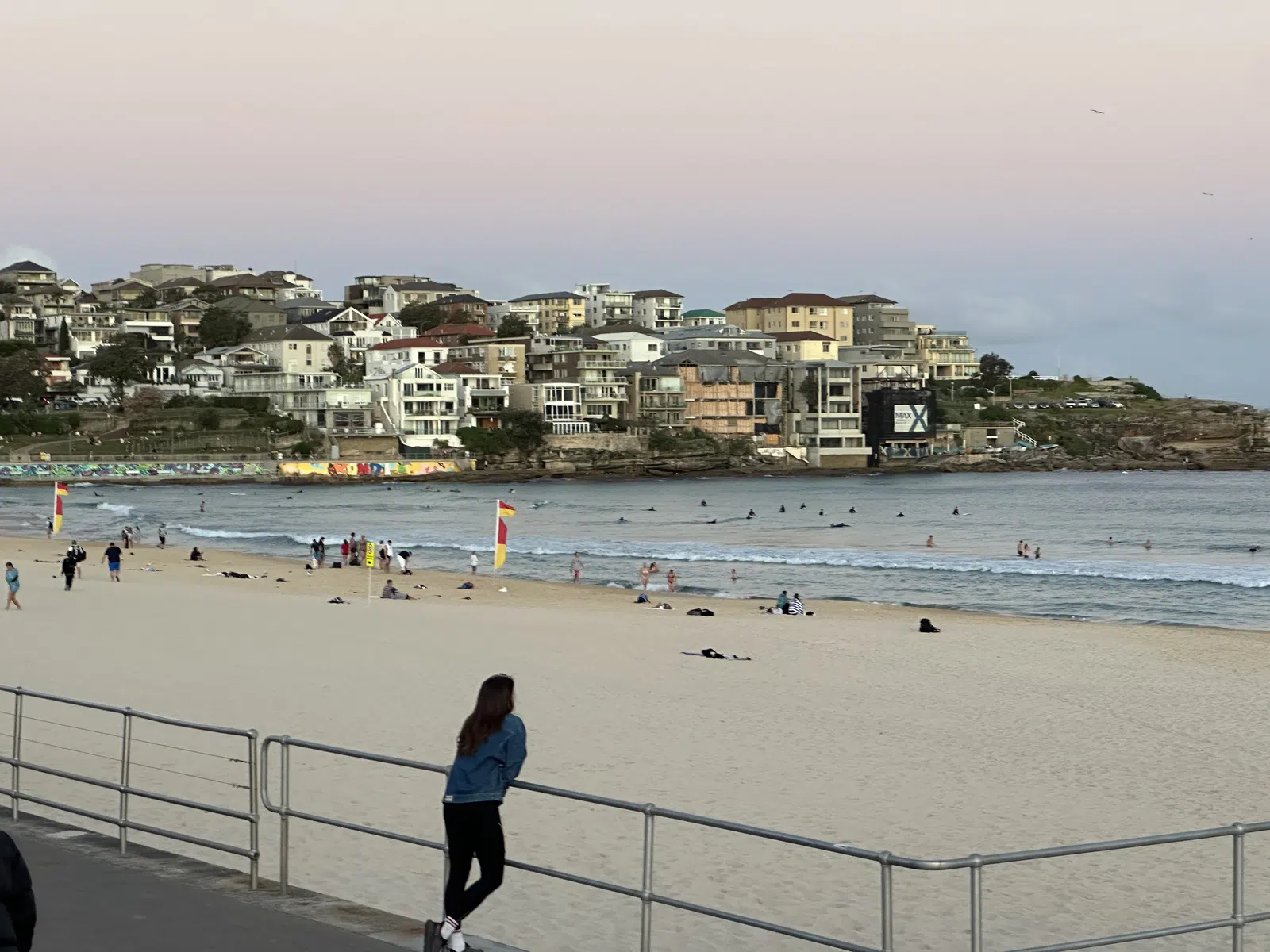 Bondi Beach swimmers and hillside