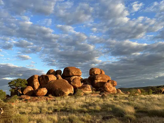 Devils Marbles Rock Field Clouds